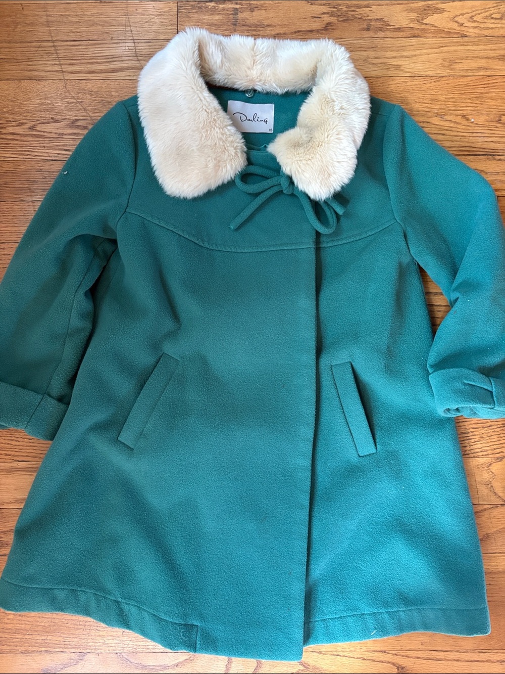 2010s winter coat with bows